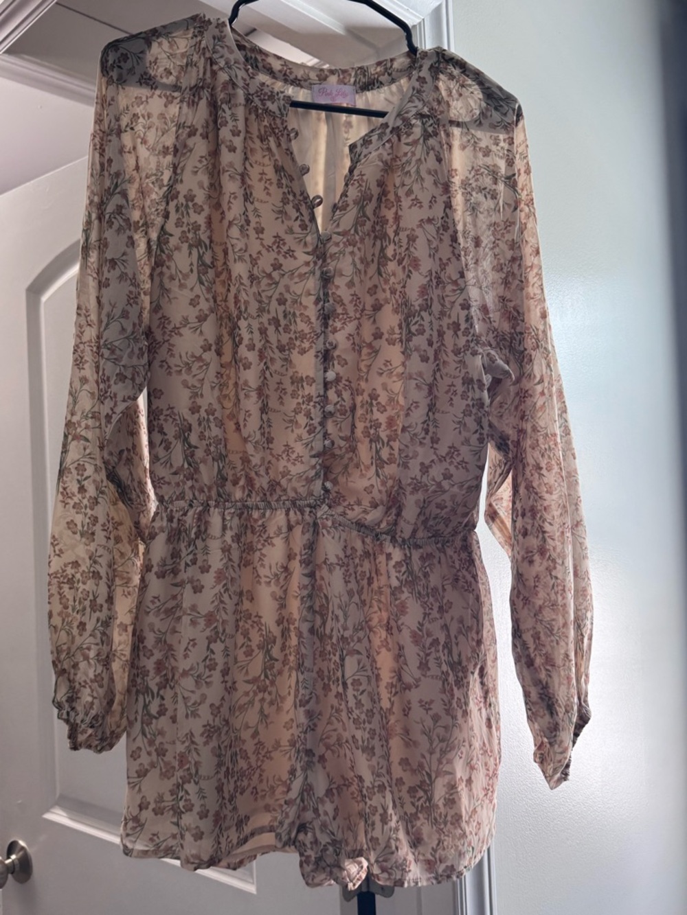 Pink Lily Beige Floral Romper with Green Leaf Accents